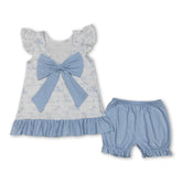 Light blue girl’s short sleeve ruffle bow top and shorts set by Mini Rodeo, featuring flutter sleeves and a playful design.