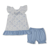Light blue girl’s short sleeves top and shorts set with ruffle bow details by Mini Rodeo, perfect for warm weather.
