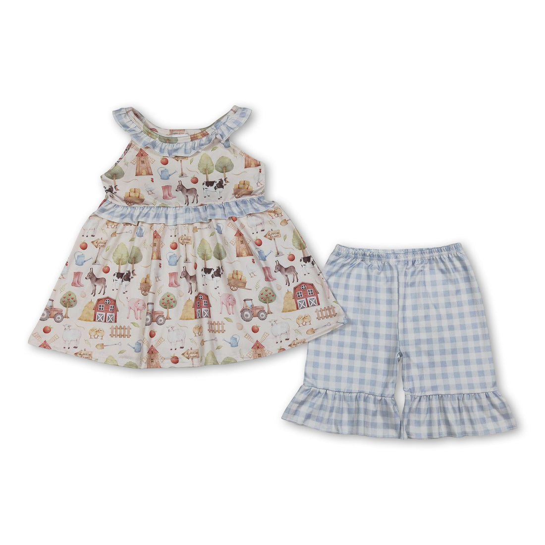 Girl wearing a sleeveless plaid ruffle tunic and shorts set by Mini Rodeo, perfect for summer outdoor activities.