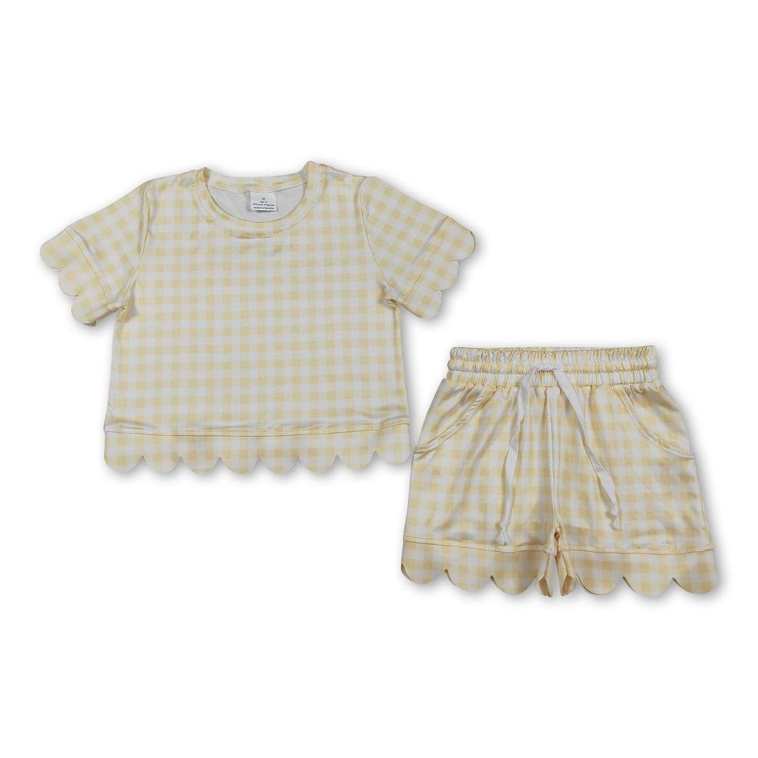 Yellow plaid scallop top and shorts set for girls by Mini Rodeo, summer short sleeves outfit with stylish scalloped details.