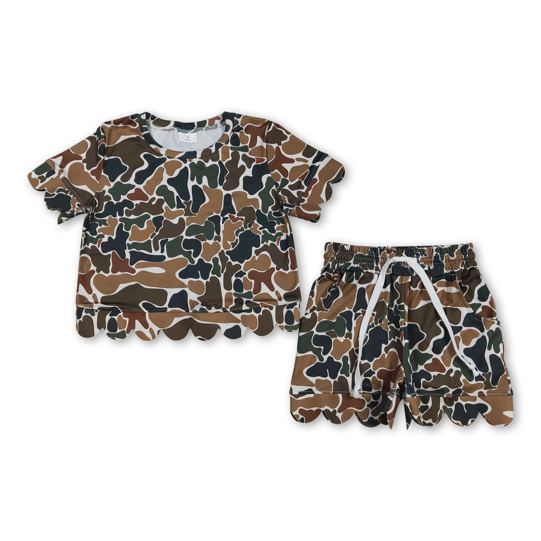 Girl wearing brown camo scallop top and shorts set by Mini Rodeo, summer outfit with short sleeves and comfortable fit.