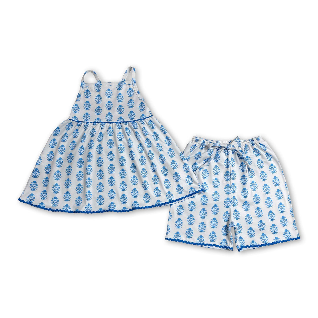 Blue floral girl’s summer outfit with short sleeves and matching shorts, featuring straps, from Mini Rodeo for kids.
