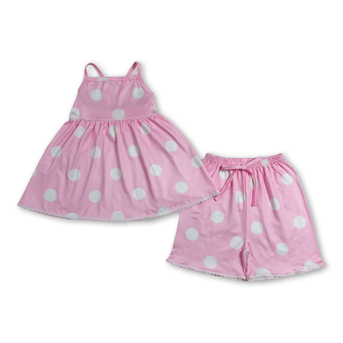 Pink polka dot girl shorts set with short sleeves, included tunic top, from Mini Rodeo summer clothes for girls.
