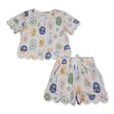 Toddler girl short sleeves scallop floral summer top and shorts set by Mini Rodeo, perfect for warm weather.