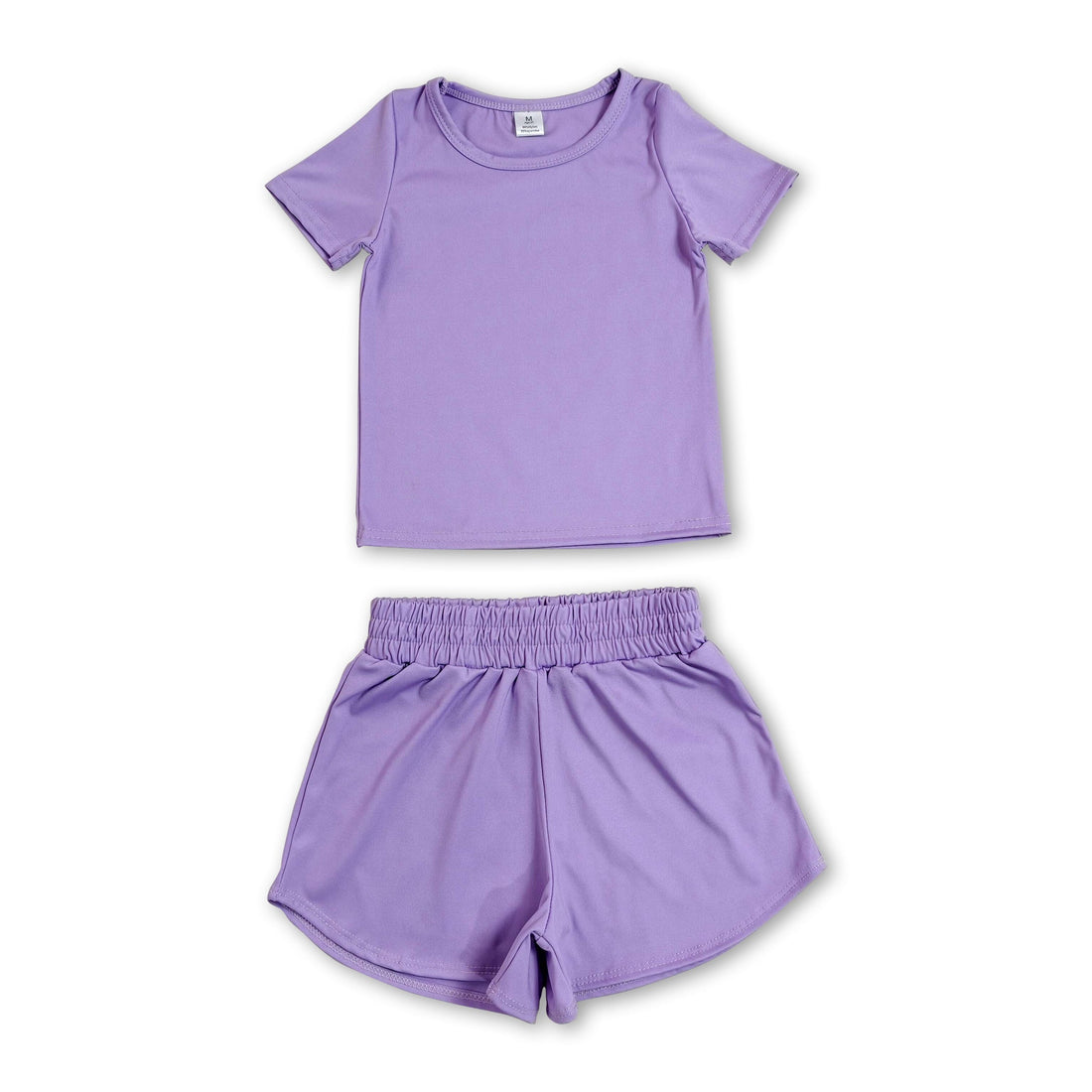 Kids girls purple short sleeve top and shorts yoga active set from Mini Rodeo, perfect for active wear and play.
