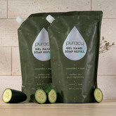 Puracy gel hand soap refill pack showing two 16-ounce bottles with clear gel soap in a natural pump dispenser.