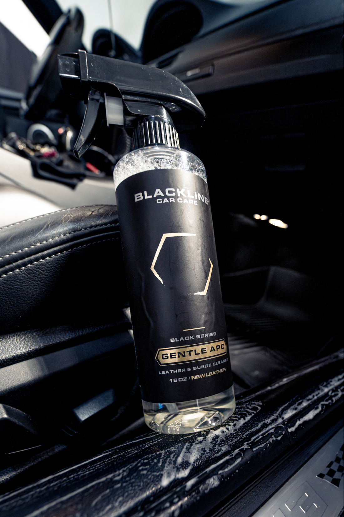 Blackline Car Care BLACKLINE® Gentle APC all-purpose cleaner applied to a car door sill for cleaning and detailing.