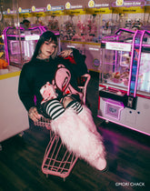 Big Gloomy Knit Sweater by Any Means Necessary Clothing, featuring dark, cozy knit fabric and a relaxed fit.