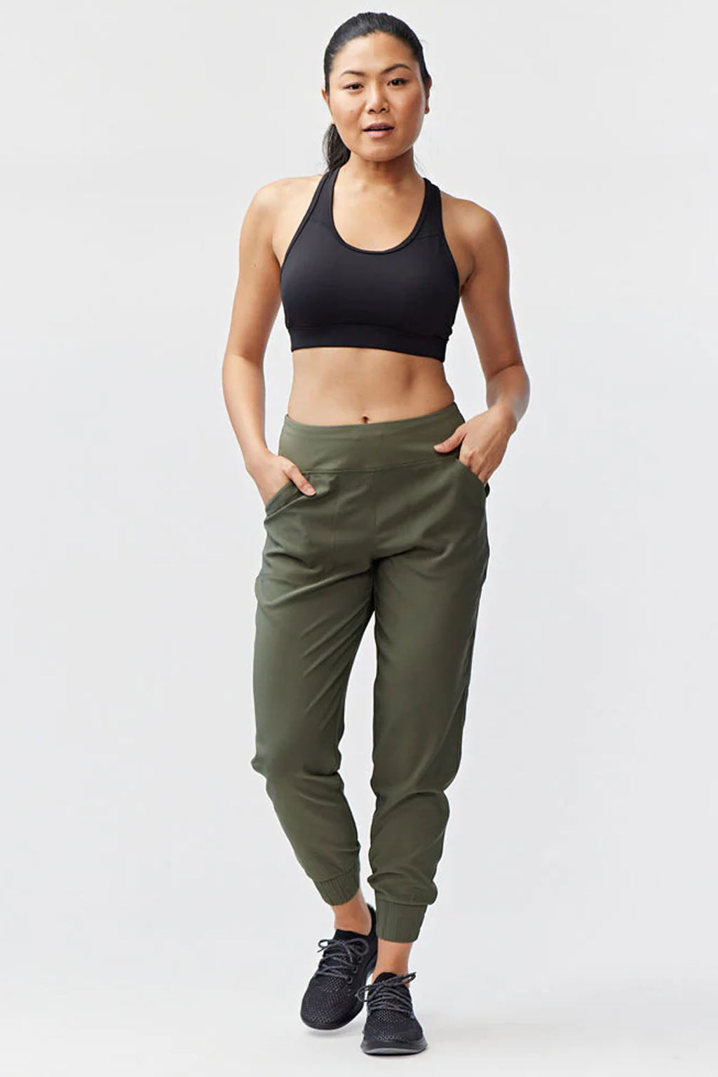 Dark moss green Goal Five Excel Jogger 7/8 length training pant with tapered fit and elastic waistband, 28-inch inseam.