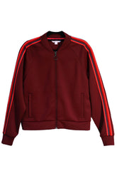 Goal Five Powerstripe LS Track Jacket in Merlot, lifestyle image showing sporty outerwear with striped design and comfortable fit.