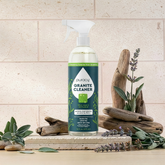 Puracy Granite Cleaner 16oz bottle with label, designed for cleaning and polishing kitchen granite countertops.