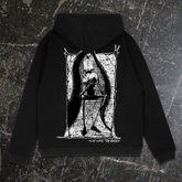 Black hoodie from Any Means Necessary Clothing featuring a back graphic design with the word "Grief" for a stylish, casual look.