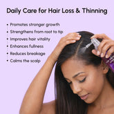 Maree 4-in-1 Hair Growth Spray bottle with clear nozzle, designed to promote hair growth and scalp health.