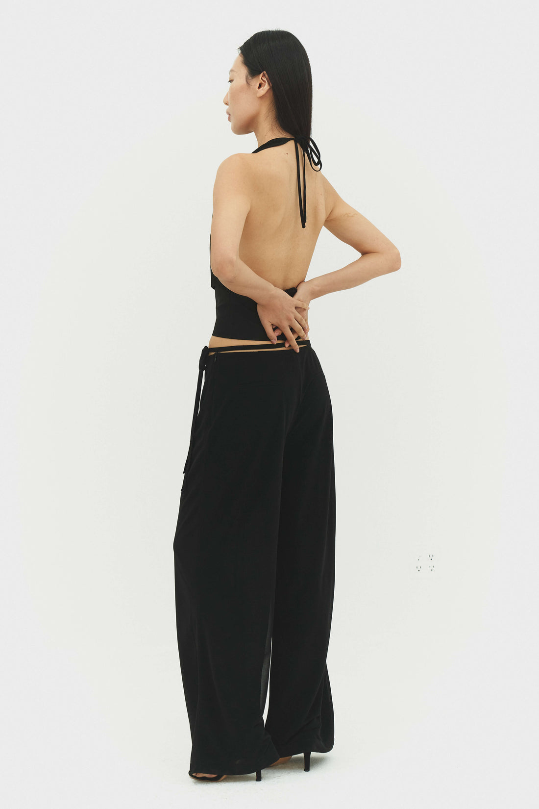 Black Emilia pants by findmenowthelabel, stylish women’s trousers with a comfortable fit and sleek design.