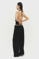 Black Emilia pants by findmenowthelabel, stylish women’s trousers with a comfortable fit and sleek design.