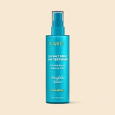 Maree Keratin & Sea Salt Hair Texturizer spray applied to wavy hair, adding volume and beachy texture.