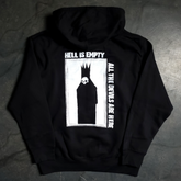 Black zip-up hoodie from Any Means Necessary Clothing with "Hell is Empty" graphic on the back, casual streetwear style.