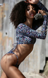 Forever Young Swimwear Huntington bikini crop top with adjustable straps and vibrant print, perfect for beach or poolside wear.