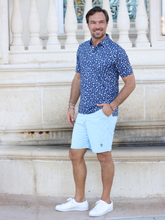White Water Life Starboard Shorts laid flat, showcasing their casual design and lightweight fabric for outdoor and beach wear.