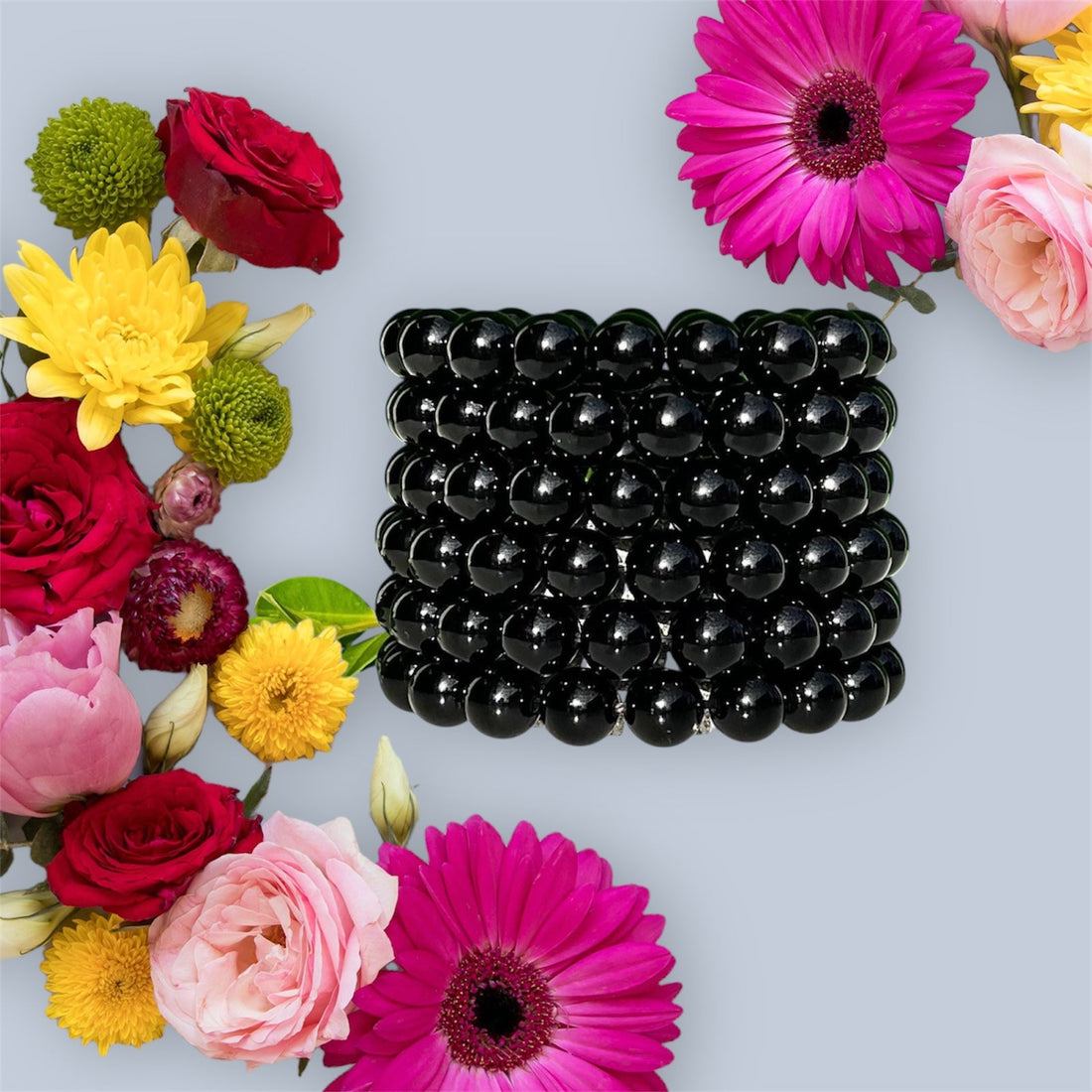 Onyx stretch bracelet with 10mm beads from Evermore Everlasting, featuring smooth black onyx stones on a flexible elastic band.