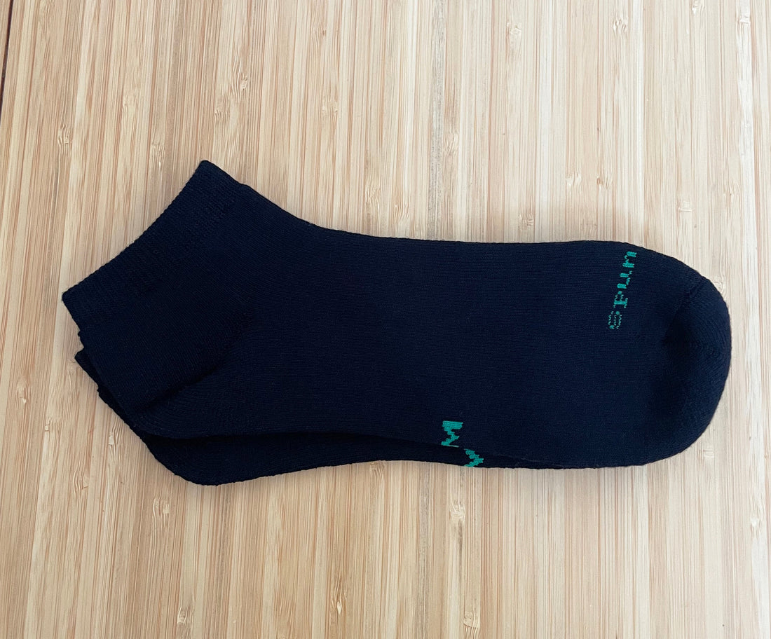 Black clearance No Look anklet socks by Spun Bamboo made from bamboo viscose, shown laid flat.