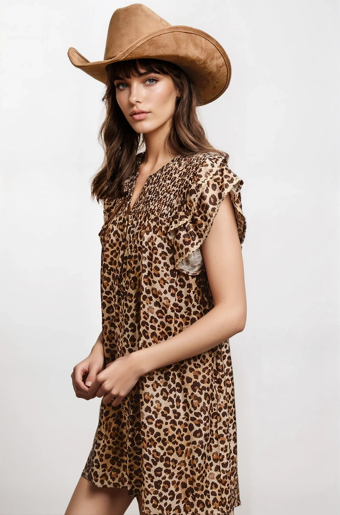 Desert Muse Leopard Ruffle Dress by Fitkitty Culture, showcasing a stylish leopard print dress with ruffle details on a model.