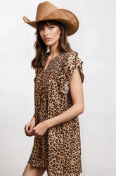 Desert Muse Leopard Ruffle Dress by Fitkitty Culture, showcasing a stylish leopard print dress with ruffle details on a model.