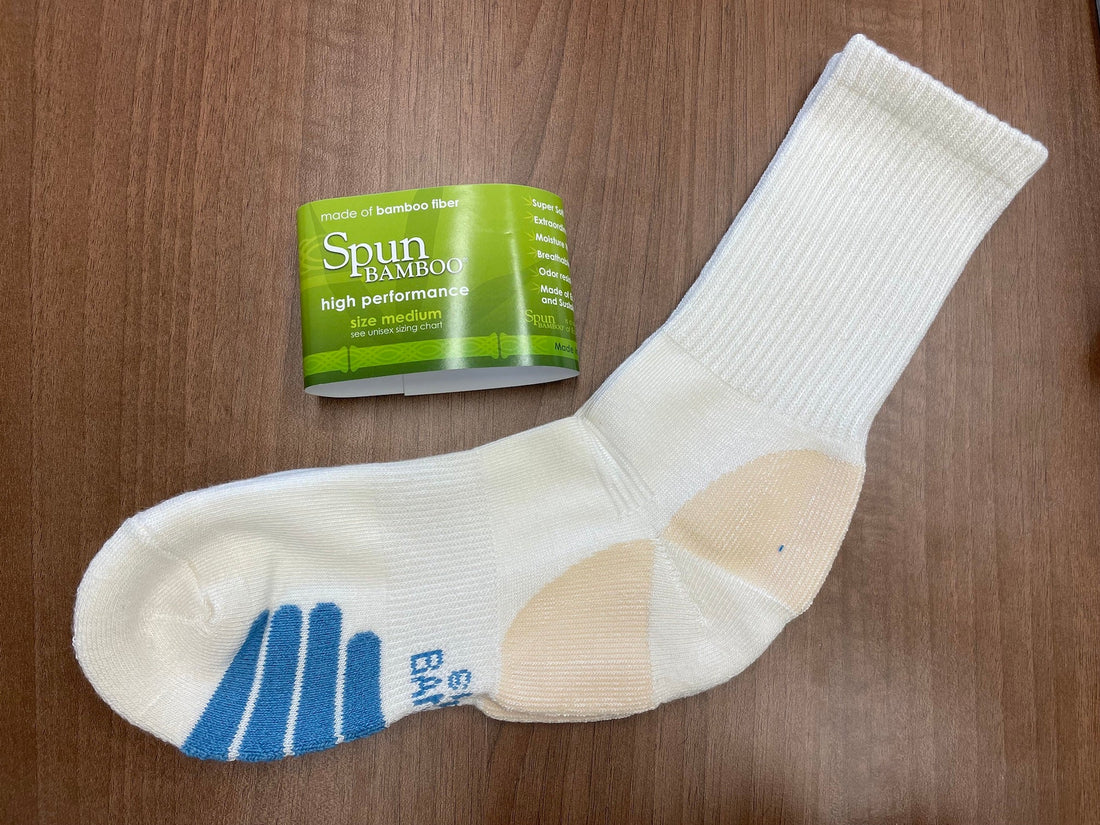 Unisex white bamboo viscose crew socks from Spun Bamboo, 5-pack, showing the smooth fabric and comfortable fit.