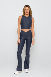 Black leather-look crossover flare leggings from Fitkitty Culture Athleisure Wear, featuring stylish, high-waisted design and comfortable fit.