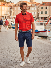 Navy Independence Performance Polo shirt by White Water Life displayed with shorts, casual outdoor clothing for active wear.