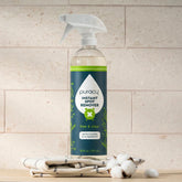 Puracy Instant Spot Remover in a 25oz bottle, liquid stain remover for fabric and upholstery cleaning.