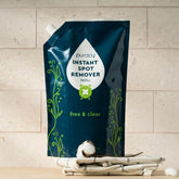 Puracy Instant Spot Remover refill bottle with cleaning spray for removing stains from fabrics and surfaces.