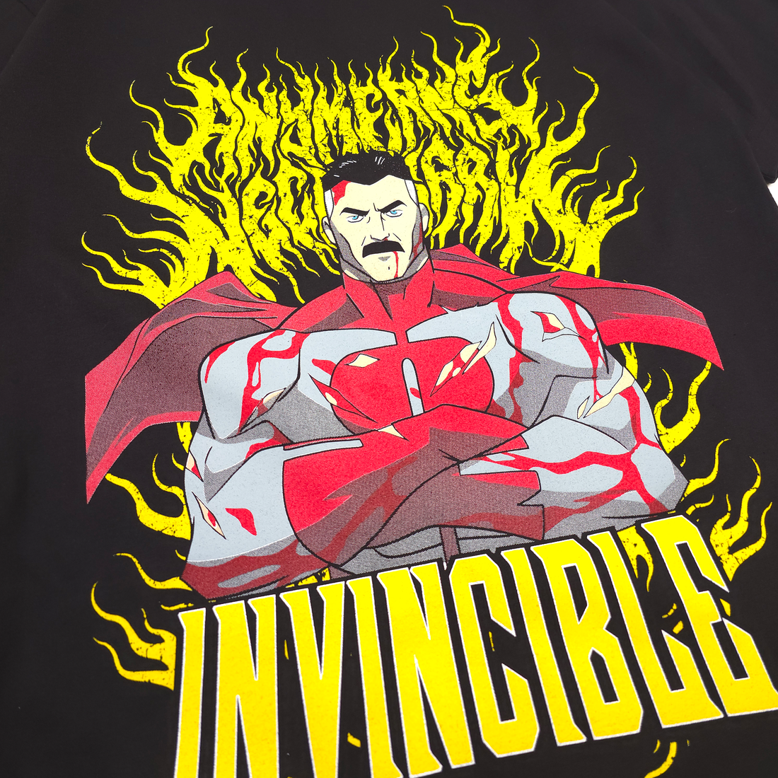 Close-up of Omni-Man T-shirt from Any Means Necessary Clothing featuring detailed graphic of Omni-Man from Invincible.