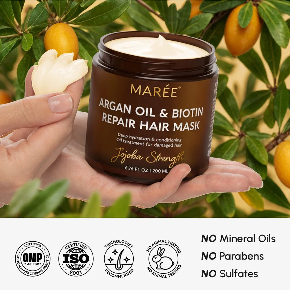 Maree Argan Oil and Biotin Hair Repair Mask with jojoba oil, shown in a jar with creamy texture, ideal for nourishing damaged hair.