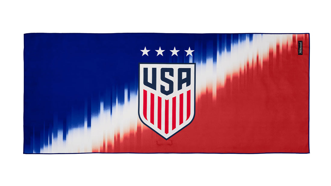 U.S. Soccer 2024 Knockaround Adventure Towel by Goal Five, showing the front design with vibrant sports-themed graphics.