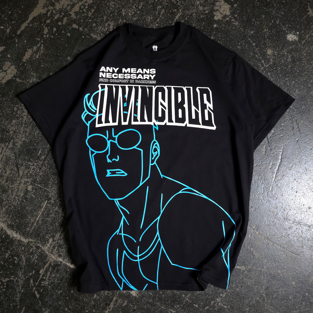 Black Invincible Line Art Series T-Shirt by Any Means Necessary Clothing featuring a bold front line art design.