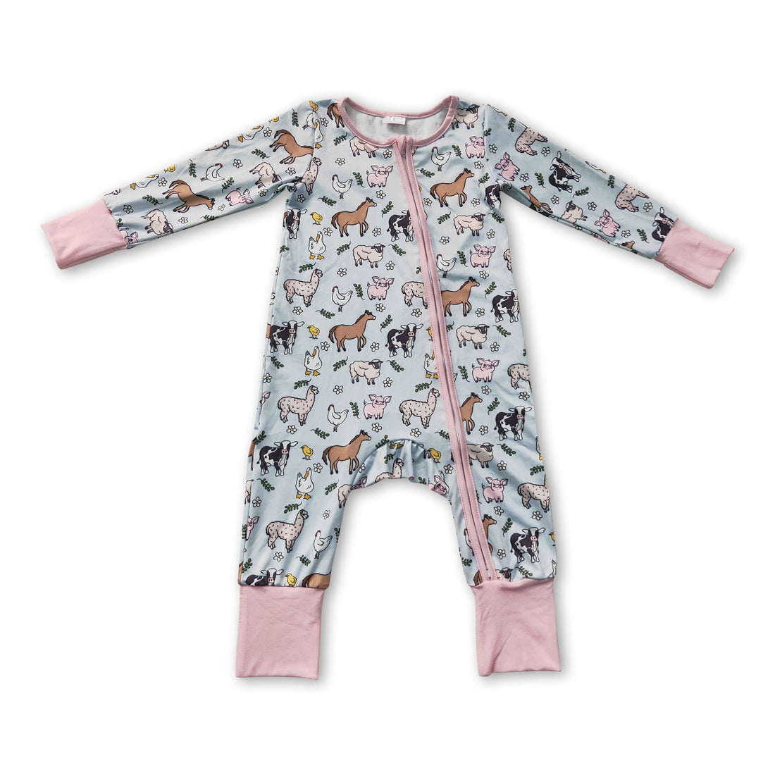 Pink pig, chicken, and cow farm-themed baby girl zipper romper by Mini Rodeo, featuring playful animal prints and soft fabric.