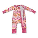 Pink ruffle bows baby girl romper with long sleeves and zipper, by Mini Rodeo, perfect for comfortable and adorable wear.