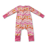 Pink ruffle bows girl sleeper romper with long sleeves and zipper closure, designed for baby girls by Mini Rodeo.