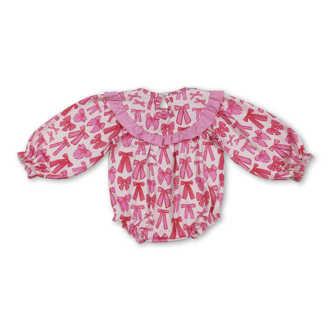 Pink bow smocked baby girl romper by Mini Rodeo featuring a Valentine’s Day theme, with a cute bow detail and soft bubble fabric.