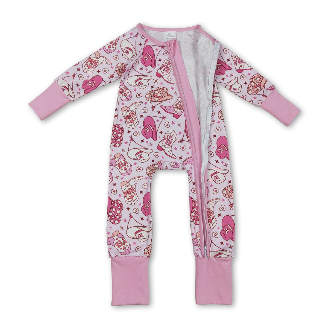 Pink heart-themed girl sleeper romper with zipper closure, featuring western-style boots and hat, by Mini Rodeo.