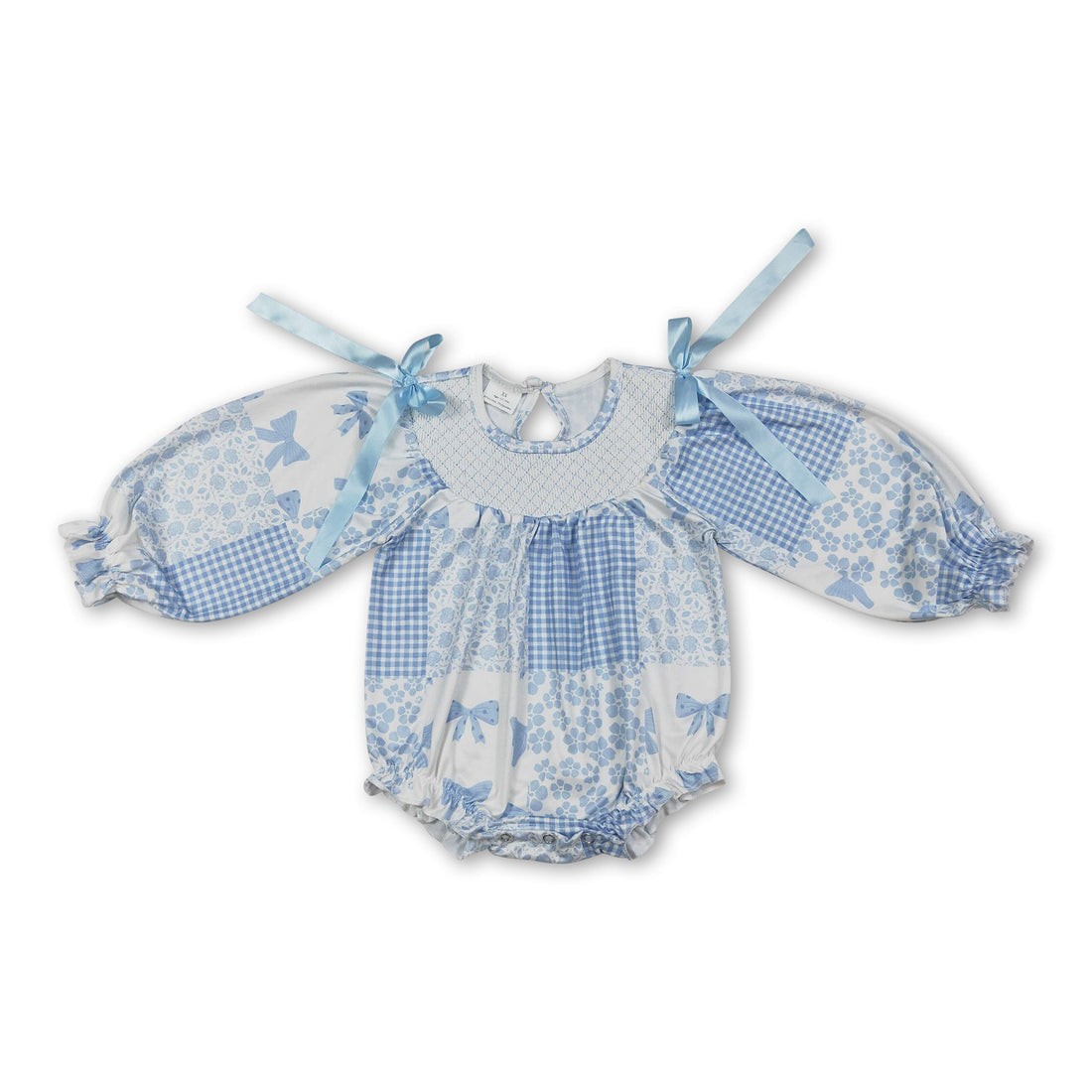 Light blue floral baby girls romper with long sleeves, smocked waist, and bow detail by Mini Rodeo, designed for girl bubbles.