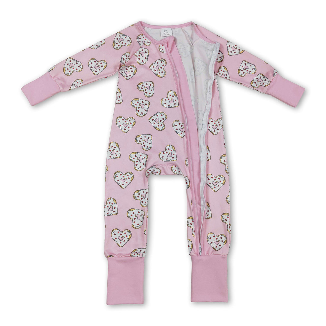 Baby girl’s long sleeve Valentine’s romper with heart donut print by Mini Rodeo, featuring a cute girl sleeper design.