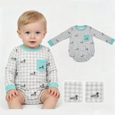 Mini Rodeo boy romper with duck embroidery, plaid pattern, and pocket detail, designed for comfortable everyday wear.