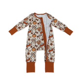 Mini Rodeo girl sleeper romper featuring pumpkin pie turkey bow design, ideal for Thanksgiving dress-up for baby girls.