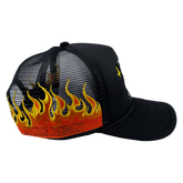 Side view of Any Means Necessary Clothing Let the Weak Burn trucker hat with mesh back and adjustable strap.