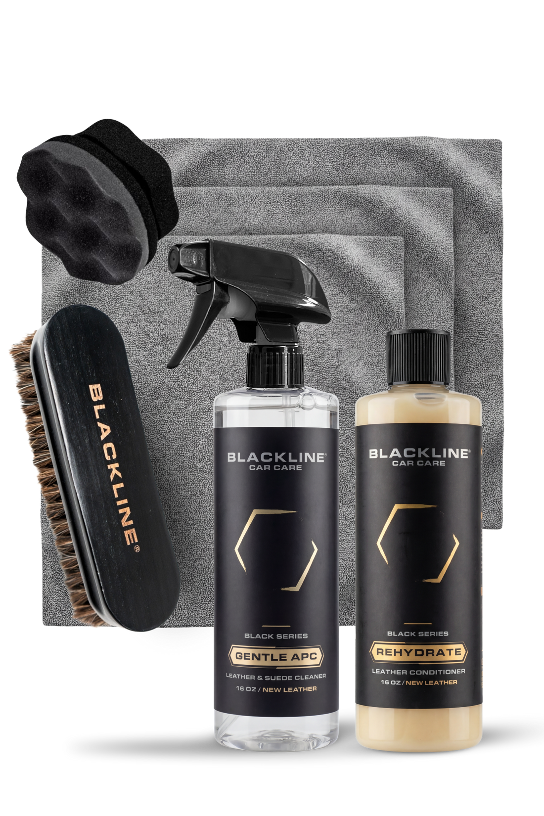 Blackline Car Care BLACKLINE® Gentle APC all-purpose cleaner being applied with a leather brush for cleaning car interiors.