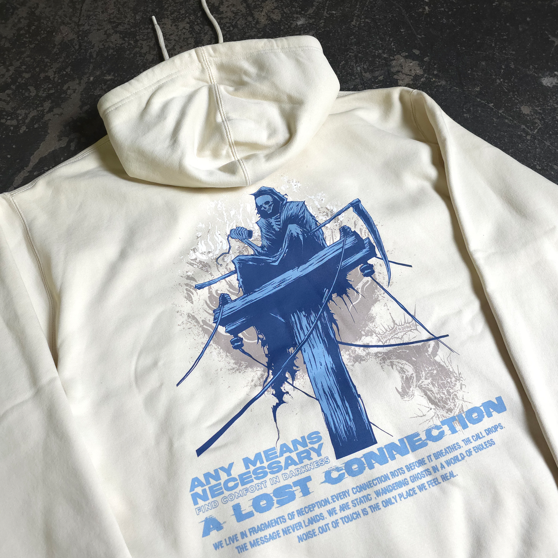 Bone-colored Lost Connection hoodie by Any Means Necessary Clothing, featuring a comfortable pullover design and graphic print.