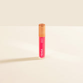 YENSA Luxe Lip Nourishing Oil with hyaluronic and vitamin E, pink shiny lip oil in a sleek tube.
