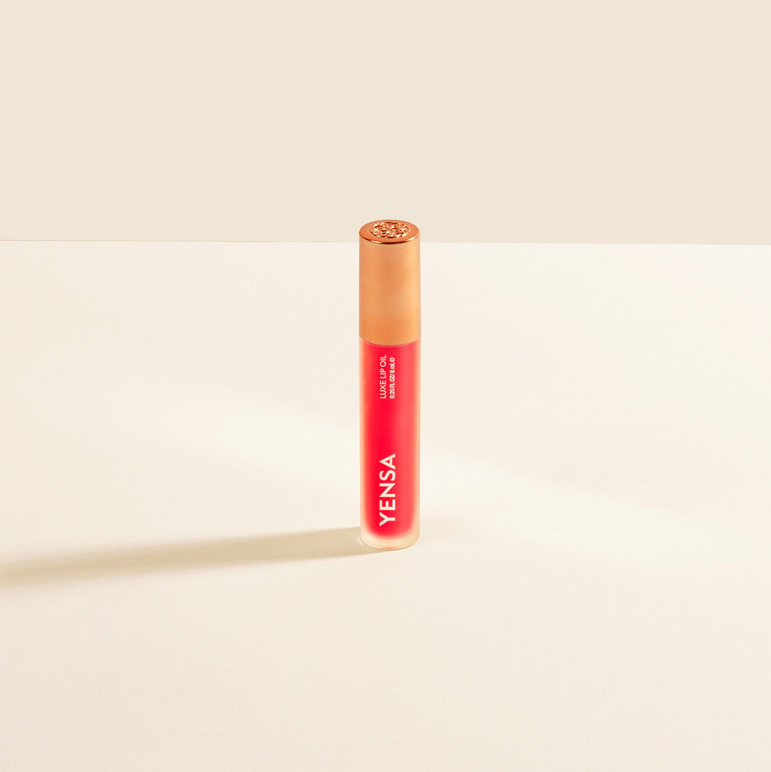 YENSA Luxe Lip Nourishing Oil in Power Pink, a hydrating lip oil with hyaluronic acid and vitamin E for smooth, glossy lips